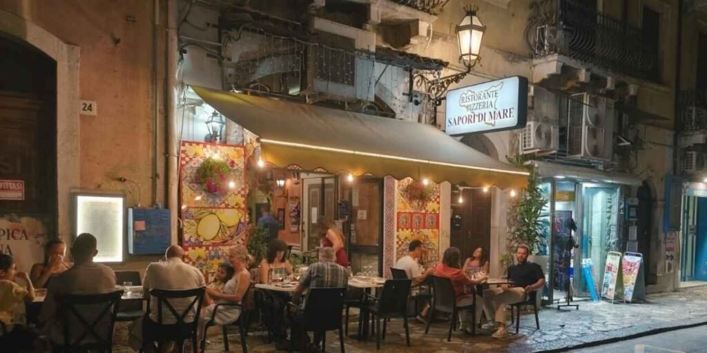 taormina,ristorante,cucina,sicilia,menù,tradizione,pesce,grigliata,comfort,gastronomia,locale,servizio,sala,franco,adil,squadra,arte,papotto,mediterraneo,centrostorico